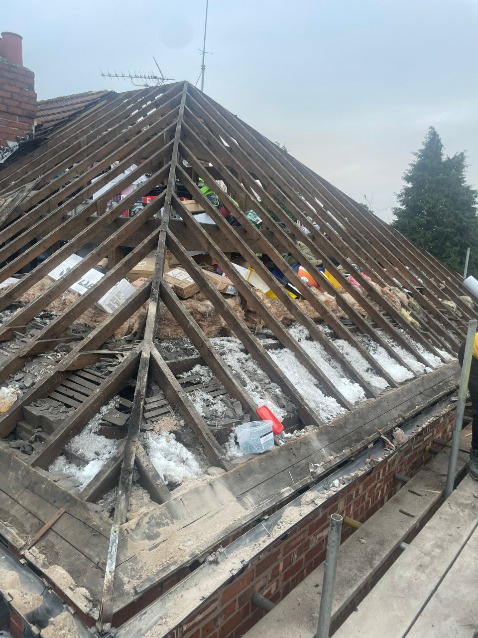 Professional roof repairs including leaks, broken tiles, and storm damage