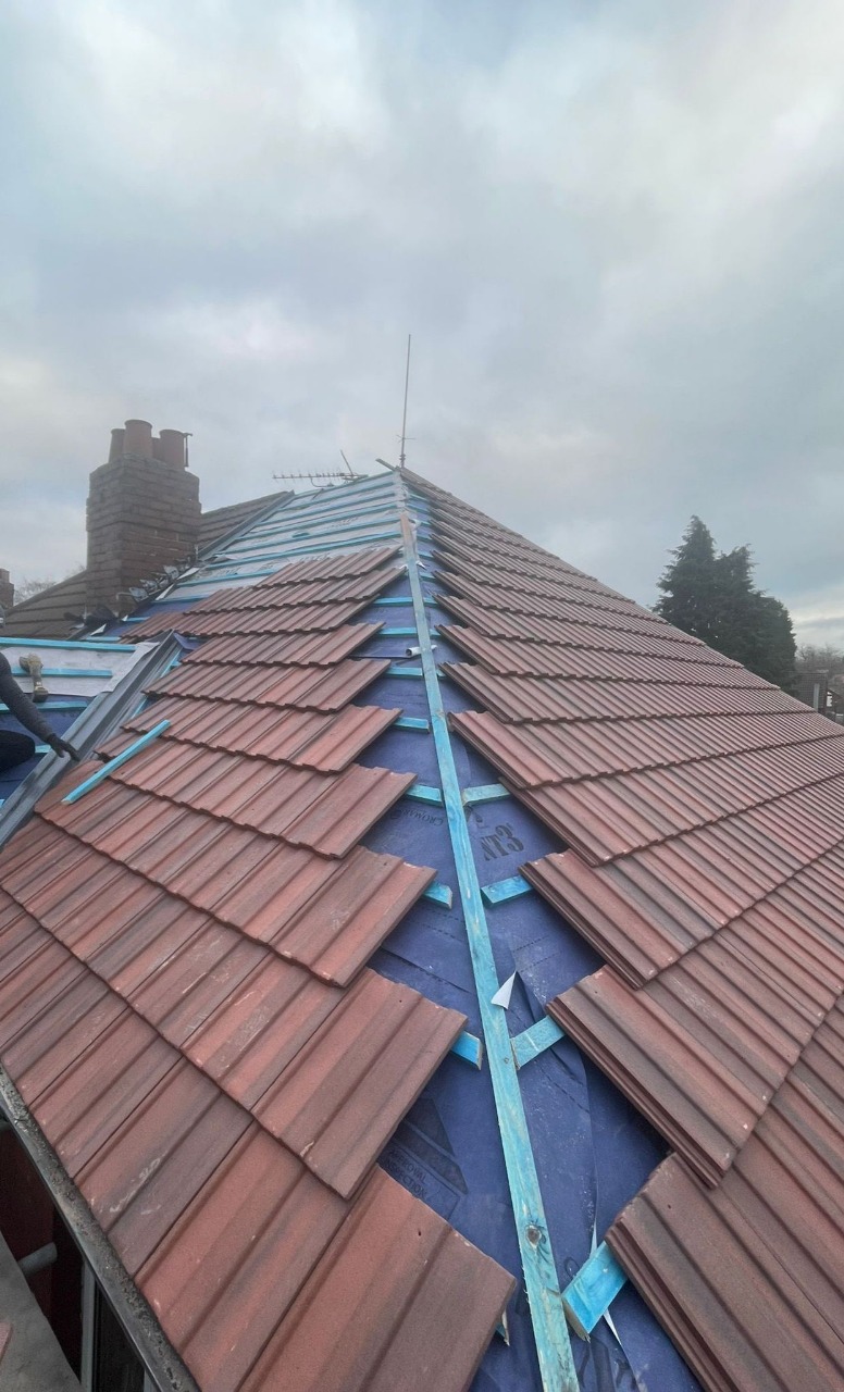 Dundalk Roofing and Building Specialists team working on a roof project