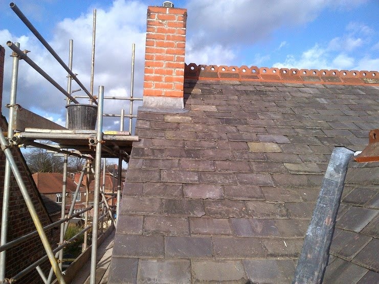 Chimney repointing, lead flashing repairs, and chimney maintenance